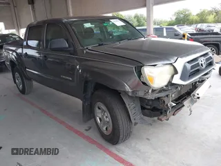 2014 Toyota Tacoma PreRunner with VIN 5TFJX4GN1EX033709, listed as a IAAI auction lot 42138812 with 168,561 mi miles and . Bid and sale history available at DreamBid. Image 1.