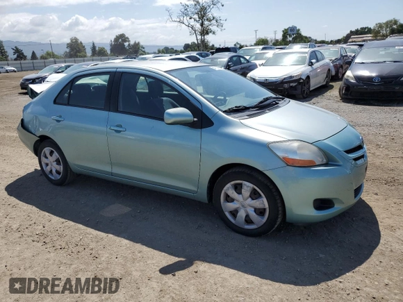 2008 Toyota Yaris with VIN JTDBT923481241884, listed as a Copart auction lot 54702185 with 82,053 mi miles and Salvage Title. Bid and sale history available at DreamBid. Image 4.