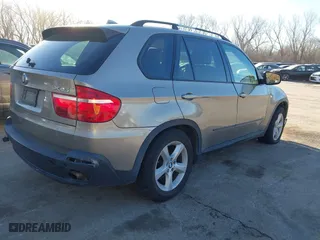 2007 BMW X5 3.0si with VIN 5UXFE43557L011254, listed as a IAAI auction lot 41696843 with 201,402 mi miles. Bid and sale history available at carsss.com. Image 4.