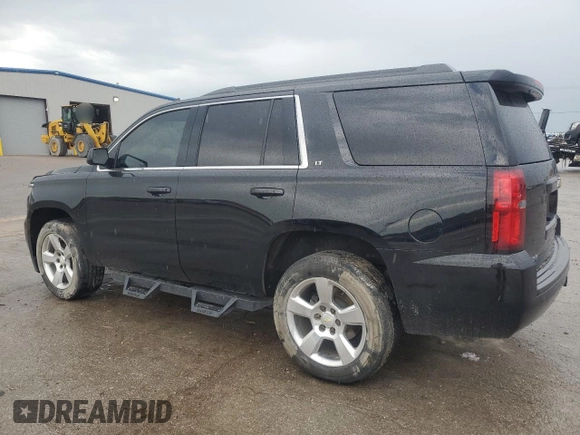 2015 Chevrolet Tahoe LT with VIN 1GNSCBKC7FR626224, listed as a Copart auction lot 54739825 with 148,030 mi miles and Salvage title. Bid and sale history available at DreamBid. Image 2.