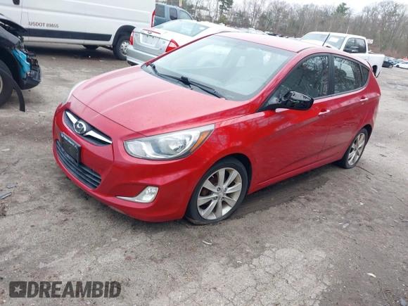 2012 Hyundai Accent SE with VIN KMHCU5AE8CU018361, listed as a IAAI auction lot 42050938 with 133,688 mi miles. Bid and sale history available at carsss.com. Image 2.