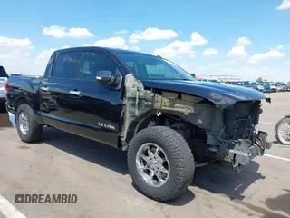 2017 Nissan Titan Platinum Reserve z VIN 1N6AA1E51HN549407, wystawiony jako IAAI lot #42408520 z przebiegiem 150 950 mil mil oraz . Historia ofert i sprzedaży dostępna na DreamBid. Obrazek 1.