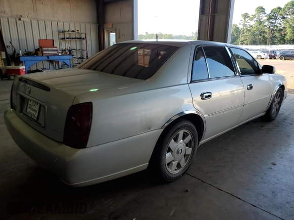 2002 Cadillac DeVille DTS with VIN 1G6KF57952U303332, listed as a Copart auction lot 61852523 with 173,500 mi miles and Clean Title. Bid and sale history available at carsss.com. Image 3.