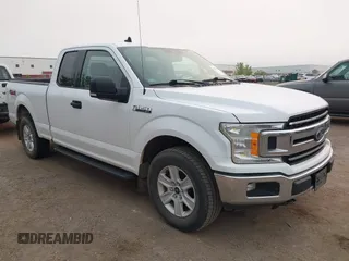 2019 Ford F-150 XL with VIN 1FTFX1E44KKD52335, listed as a IAAI auction lot 42377492 with 240,524 mi miles and . Bid and sale history available at DreamBid. Image 1.