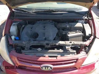 2009 Kia Sedona LX with VIN KNDMB233296307113, listed as a IAAI auction lot 41696813 with 121,722 mi miles. Bid and sale history available at carsss.com. Image 10.