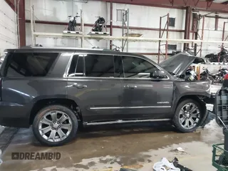 2016 GMC Yukon Denali with VIN 1GKS2CKJ8GR215954, listed as a IAAI auction lot 41362739 with 143,982 mi miles. Bid and sale history available at carsss.com. Image 12.