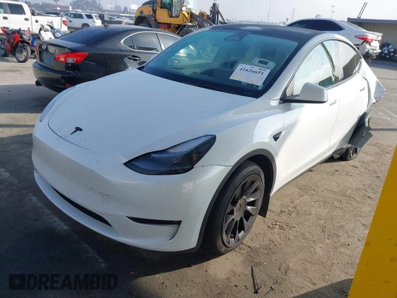 2023 Tesla Model Y Long Range with VIN 7SAYGAEE7PF766735, listed as a IAAI auction lot 41626651 with 21,983 mi miles. Bid and sale history available at carsss.com. Image 18.