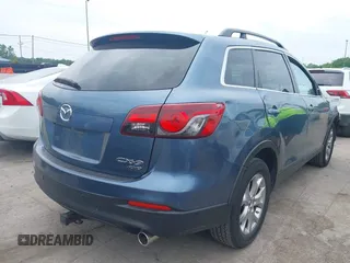 2015 Mazda CX-9 Touring with VIN JM3TB3CV9F0463819, listed as a IAAI auction lot 42506237 with 207,418 mi miles and . Bid and sale history available at DreamBid. Image 4.