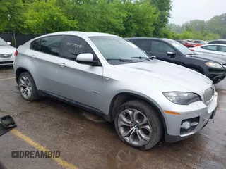 2012 BMW X6 50i z VIN 5UXFG8C58CL590171, wystawiony jako IAAI lot #42357805 z przebiegiem 83 144 mil mil oraz . Historia ofert i sprzedaży dostępna na DreamBid. Obrazek 1.