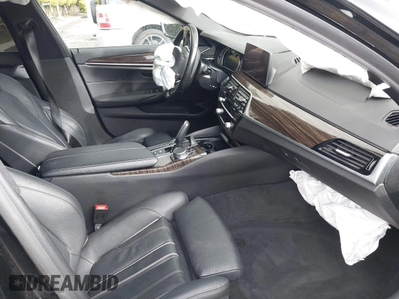 2019 BMW 5 Series 530e with VIN WBAJA9C52KB399480, listed as a IAAI auction lot 41714228 with 90,435 mi miles and . Bid and sale history available at DreamBid. Image 5.