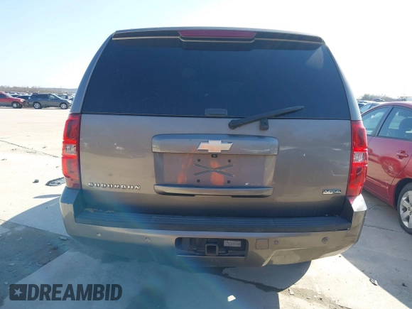 2011 Chevrolet Suburban LT with VIN 1GNSCJE03BR381301, listed as a IAAI auction lot 41412636 with 243,601 mi miles. Bid and sale history available at carsss.com. Image 16.
