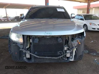 2012 Jeep Grand Cherokee Limited with VIN 1C4RJEBG7CC227488, listed as a IAAI auction lot 41881061 with 185,327 mi miles. Bid and sale history available at carsss.com. Image 6.