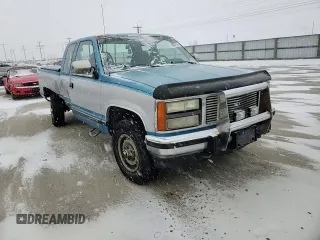 1992 GMC Sierra 2500 z VIN 2GTFK29K3N1539843, wystawiony jako Copart lot #45037335 z przebiegiem 146 355 mil mil oraz Szkody całkowita. Historia ofert i sprzedaży dostępna na DreamBid. Obrazek 11.