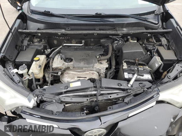 2018 Toyota RAV4 XLE with VIN 2T3RFREV8JW715099, listed as a Copart auction lot 51313485 with 140,107 mi miles and Salvage Title. Bid and sale history available at DreamBid. Image 12.