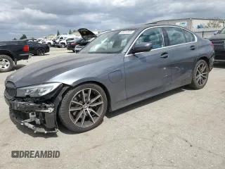 2021 BMW 3 Series 330e with VIN 3MW5P7J07M8B90476, listed as a Copart auction lot 50614505 with 55,518 mi miles and Salvage Title. Bid and sale history available at carsss.com. Image 1.