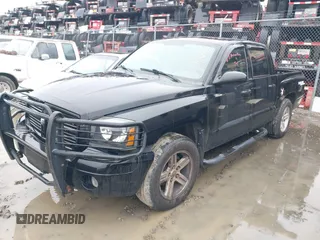 2007 Dodge Dakota SLT z VIN 1D7HW48P87S271192, wystawiony jako IAAI lot #41421142 z przebiegiem 198 588 mil mil oraz . Historia ofert i sprzedaży dostępna na DreamBid. Obrazek 2.
