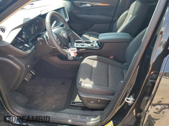 2023 Buick Envision Preferred with VIN LRBAZLR44PD018861, listed as a Copart auction lot 68694954 with 11,612 mi miles and Salvage Title. Bid and sale history available at DreamBid. Image 7.