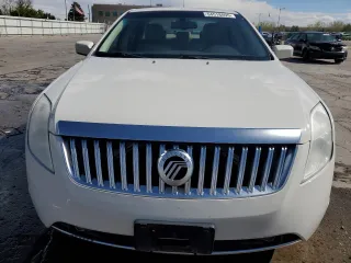 2010 Mercury Milan Premier z VIN 3MEHM0JGXAR660176, wystawiony jako Copart lot #54518095 z przebiegiem 138 634 mil mil oraz Szkoda całkowita • Salvage title. Historia ofert i sprzedaży dostępna na DreamBid. Obrazek 5.