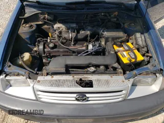1991 Toyota Tercel z VIN JT2EL46B9M0010781, wystawiony jako Copart lot #71634404 z przebiegiem 88 055 mil mil oraz Tytuł czysty. Historia ofert i sprzedaży dostępna na DreamBid. Obrazek 11.