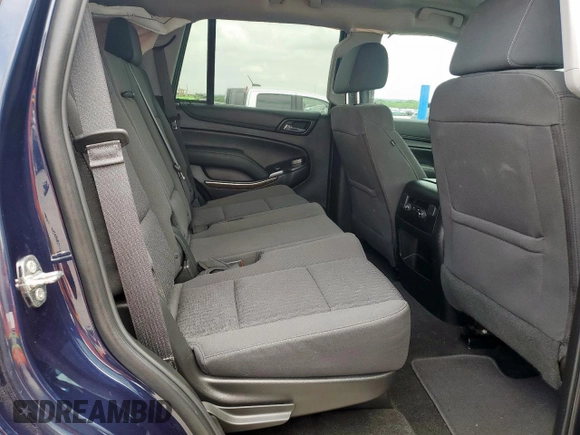 2018 Chevrolet Tahoe LS with VIN 1GNSCAKC5JR374315, listed as a Copart auction lot 54760295 with 50,580 mi miles and Salvage title. Bid and sale history available at DreamBid. Image 11.