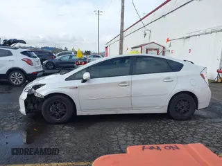 2015 Toyota Prius Four z VIN JTDKN3DU4F1883032, wystawiony jako IAAI lot #41528573 z przebiegiem 104 056 mil mil oraz . Historia ofert i sprzedaży dostępna na DreamBid. Obrazek 14.
