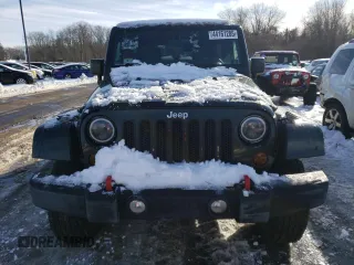 2010 Jeep Wrangler Unlimited Sahara with VIN 1J4BA5H10AL122366, listed as a Copart auction lot 44161285 with 155,108 mi miles and Salvage Title. Bid and sale history available at carsss.com. Image 5.