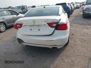 2016 Nissan Maxima SV with VIN 1N4AA6AP4GC421749, listed as a IAAI auction lot 42318579 with 120,669 mi miles and . Bid and sale history available at DreamBid. Image 15.