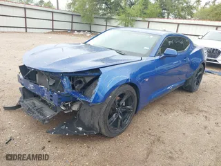 2021 Chevrolet Camaro 1LT with VIN 1G1FB1RS5M0128392, listed as a IAAI auction lot 41879369 with 35,168 mi miles. Bid and sale history available at carsss.com. Image 2.