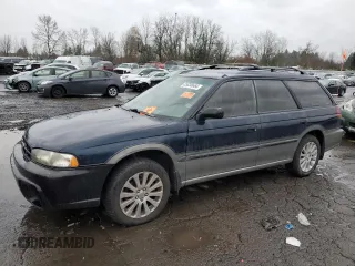 1996 Subaru Legacy with VIN 4S3BG4856T6977236, listed as a Copart auction lot 85036664 with 234,212 mi miles and Salvage title. Bid and sale history available at DreamBid. Image 1.