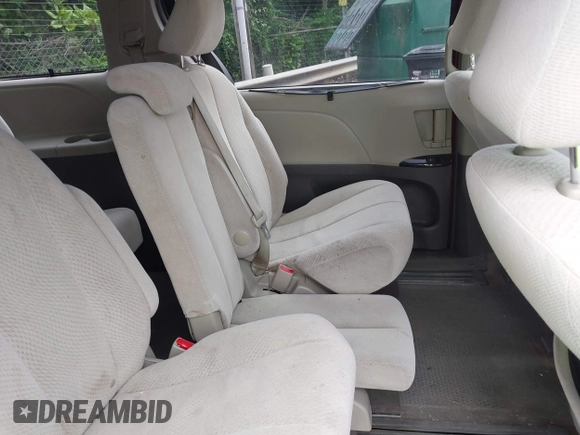 2012 Toyota Sienna z VIN 5TDKA3DC5CS012254, wystawiony jako IAAI lot #42367254 z przebiegiem 183 083 mil mil oraz . Historia ofert i sprzedaży dostępna na DreamBid. Obrazek 8.