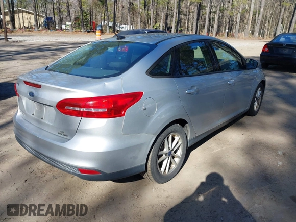 2016 Ford Focus SE with VIN 1FADP3F25GL296350, listed as a IAAI auction lot 41666826 with 125,898 mi miles and . Bid and sale history available at DreamBid. Image 4.