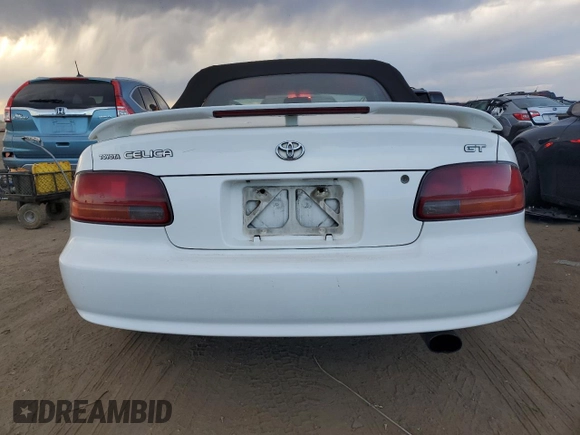 1998 Toyota Celica GT z VIN JT5FG02T2W0047564, wystawiony jako Copart lot #75727344 z przebiegiem 225 802 mil mil oraz Szkoda całkowita • Salvage title. Historia ofert i sprzedaży dostępna na DreamBid. Obrazek 6.