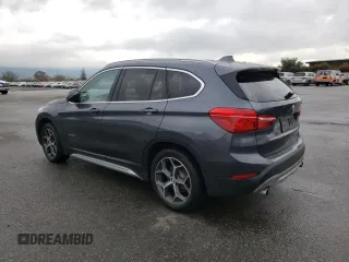 2018 BMW X1 xDrive28i with VIN WBXHT3C33J5K23187, listed as a Copart auction lot 71063192 with 97,403 mi miles. Bid and sale history available at carsss.com. Image 2.