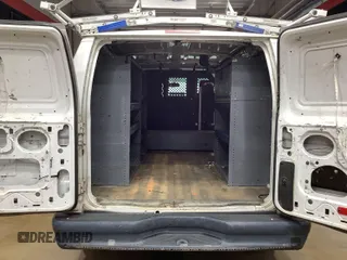 2013 Ford Econoline Cargo Commercial with VIN 1FTNE1EW9DDA61968, listed as a IAAI auction lot 42643038 with 121,719 mi miles and . Bid and sale history available at DreamBid. Image 6.
