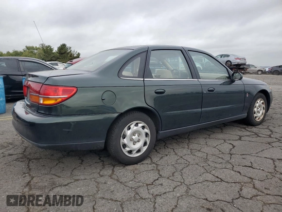 2001 Saturn LS z VIN 1G8JU54F41Y581083, wystawiony jako Copart lot #73123714 z przebiegiem 98 500 mil mil oraz Szkody całkowita. Historia ofert i sprzedaży dostępna na DreamBid. Obrazek 3.
