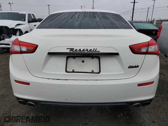 2016 Maserati Ghibli z VIN ZAM57XSA2G1175656, wystawiony jako Copart lot #44798125 z przebiegiem 105 496 mil mil oraz Szkody całkowita. Historia ofert i sprzedaży dostępna na DreamBid. Obrazek 6.