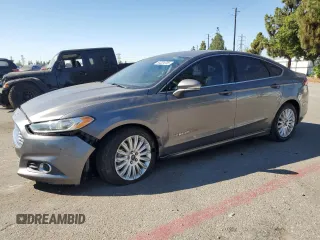 2013 Ford Fusion SE Hybrid с VIN 3FA6P0LU4DR219902, выставлен на аукционе Copart как лот 64324705 с пробегом 184 828 миль миль и Списание • Salvage title. История ставок и продаж доступна на DreamBid. Изображение 1.