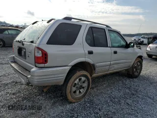 2001 Isuzu Rodeo S with VIN 4S2CK58W114317183, listed as a Copart auction lot 76280974 with 318,201 mi miles and Non Repairable. Bid and sale history available at DreamBid. Image 3.
