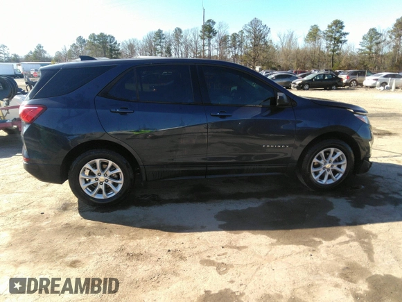 2019 Chevrolet Equinox LS z VIN 3GNAXHEV9KL240938, wystawiony jako IAAI lot #41821748 z przebiegiem 115 641 mil mil oraz . Historia ofert i sprzedaży dostępna na DreamBid. Obrazek 13.