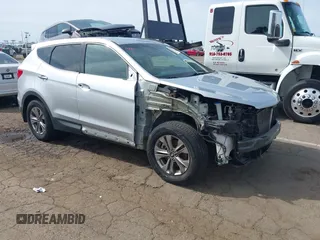 2016 Hyundai Santa Fe z VIN 5XYZUDLB3GG308266, wystawiony jako IAAI lot #42027841 z przebiegiem 48 634 mil mil oraz . Historia ofert i sprzedaży dostępna na DreamBid. Obrazek 1.