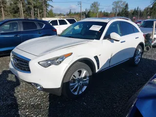 2014 Infiniti QX70 with VIN JN8CS1MW2EM411237, listed as a IAAI auction lot 42011806 with 148,133 mi miles and . Bid and sale history available at carsss.com. Image 17.