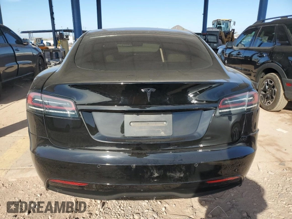 2022 Tesla Model S z VIN 5YJSA1E51NF474743, wystawiony jako Copart lot #87316374 z przebiegiem Nie podano mil oraz Szkoda całkowita • Salvage title. Historia ofert i sprzedaży dostępna na DreamBid. Obrazek 6.