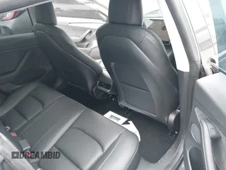 2023 Tesla Model 3 z VIN 5YJ3E1EAXPF403095, wystawiony jako IAAI lot #42151764 z przebiegiem 17 872 mil mil oraz . Historia ofert i sprzedaży dostępna na DreamBid. Obrazek 8.