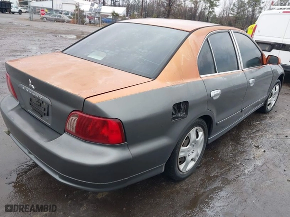 2003 Mitsubishi Galant ES with VIN 4A3AA46G83E136877, listed as a IAAI auction lot 41469411 with 307,492 mi miles. Bid and sale history available at carsss.com. Image 4.