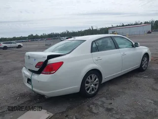2010 Toyota Avalon XL with VIN 4T1BK3DB8AU354533, listed as a IAAI auction lot 41802797 with 117,956 mi miles and . Bid and sale history available at carsss.com. Image 4.