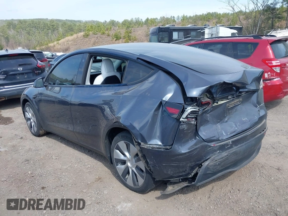 2022 Tesla Model Y Long Range z VIN 7SAYGDEE2NF447998, wystawiony jako IAAI lot #41704968 z przebiegiem 34 088 mil mil oraz . Historia ofert i sprzedaży dostępna na DreamBid. Obrazek 3.