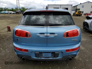 2017 MINI Clubman Cooper S z VIN WMWLU5C5XH2E83566, wystawiony jako Copart lot #57919305 z przebiegiem 89 983 mil mil oraz Tytuł czysty. Historia ofert i sprzedaży dostępna na DreamBid. Obrazek 6.