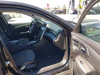 2015 Chevrolet Malibu LT with VIN 1G11D5SLXFF203652, listed as a IAAI auction lot 41848616 with 201,745 mi miles and . Bid and sale history available at DreamBid. Image 5.