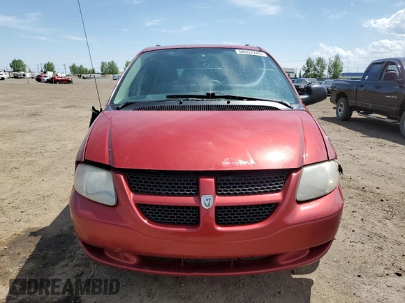 2007 Dodge Grand Caravan SE with VIN 1D4GP24R17B233725, listed as a Copart auction lot 58557245 with 306,473 mi miles and Salvage title. Bid and sale history available at DreamBid. Image 5.