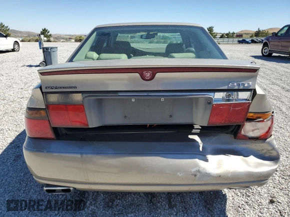 2000 Cadillac Seville Touring STS z VIN 1G6KY5498YU255607, wystawiony jako Copart lot #71130714 z przebiegiem 146 046 mil mil oraz Szkoda całkowita • Salvage title. Historia ofert i sprzedaży dostępna na DreamBid. Obrazek 6.